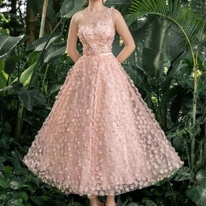 Pink dress with flowers.